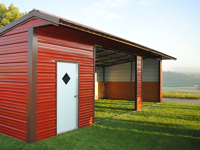 Metal loafing shed delivered and set in a pasture